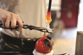 geste d'un artisan verrier